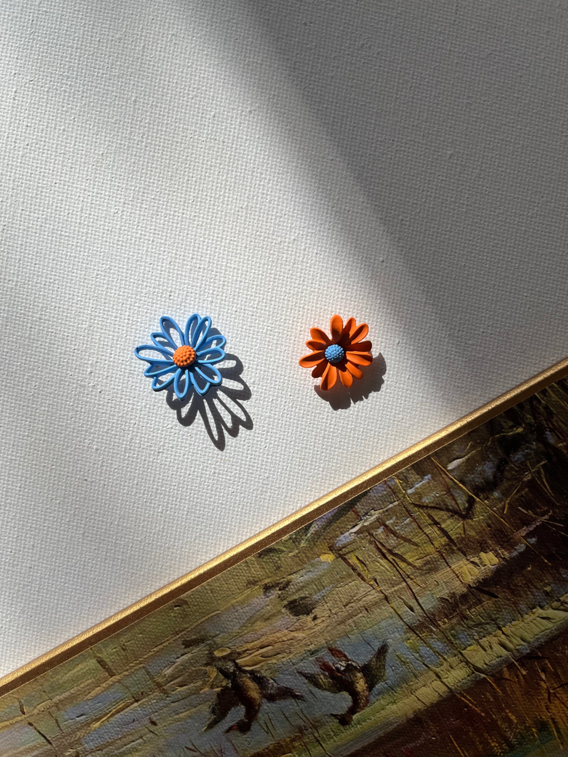 Mismatched Orange and Blue Daisy Earrings 1